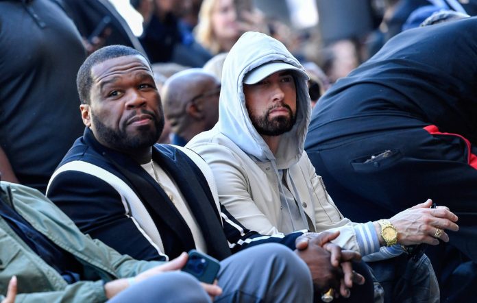 50 Cent and Eminem attend the Hollywood Walk of Fame Star Ceremony for US rapper Dr. Dre in Hollywood, California, on March 19, 2024. (Photo by VALERIE MACON / AFP) (Photo by VALERIE MACON/AFP via Getty Images)