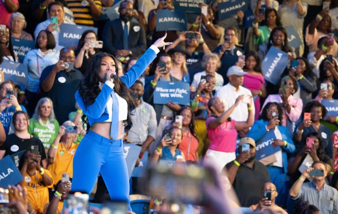 Megan Thee Stallion performing at a rally for Kamala Harris in Atlanta. Photo credit: Megan Varner/Getty Images