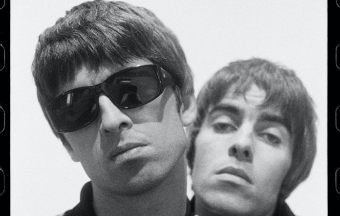 a black and white photo of Oasis' Noel and Liam Gallagher