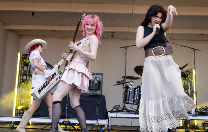 Aurora Nishevci, Emily Roberts and Abigail Morris of The Last Dinner Party perform during Lollapalooza at Grant Park on August 04, 2024 in Chicago, Illinois. (Photo by Barry Brecheisen/WireImage)